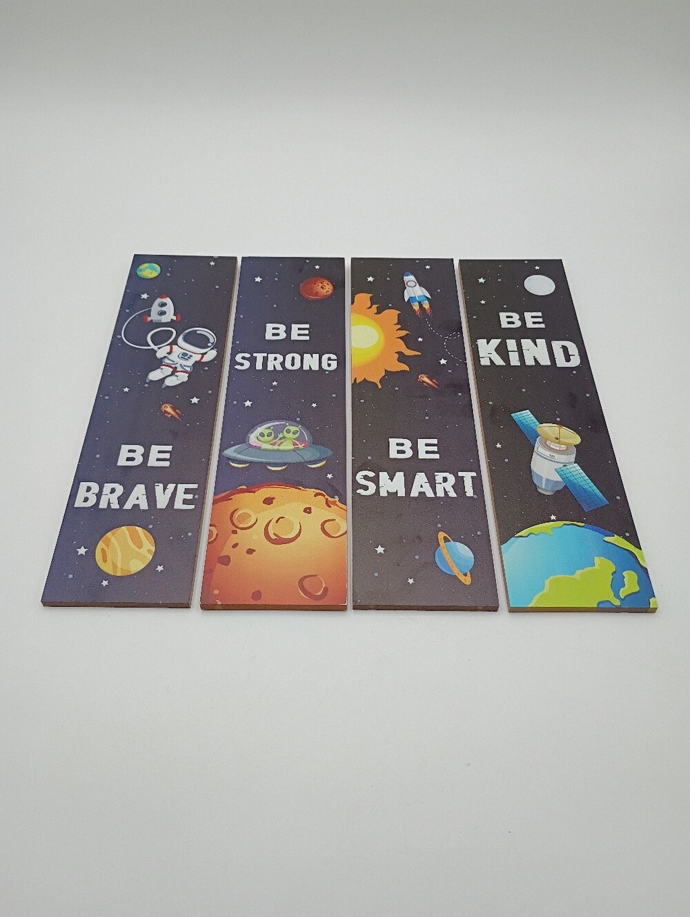 Kid's wall art. 4 pieces each approx 12x3.25 in.